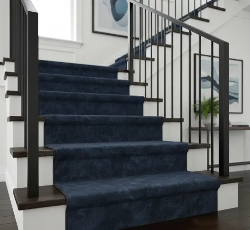 Solid navy blue velvet stairs carpet runner on dark wood steps with modern black metal railings.