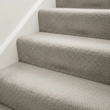 Custom fitted wall-to-wall stair carpet with precise step alignment