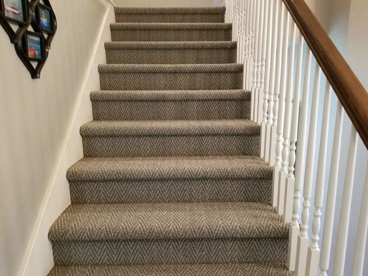 Nylon stair carpet installation on apartment stairs