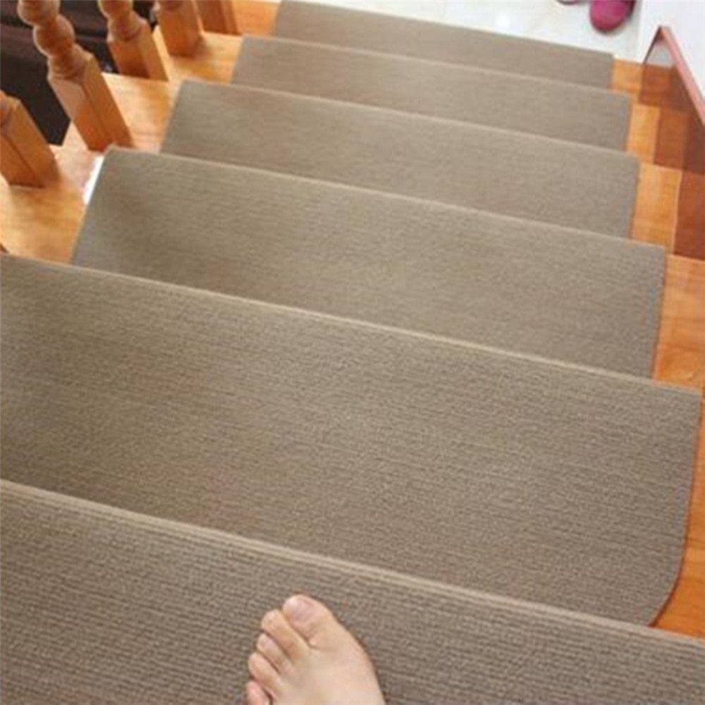 synthetic wall-to-wall stair carpet with slight real-life wear