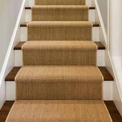 woven sisal carpet runner with a slim fabric border.