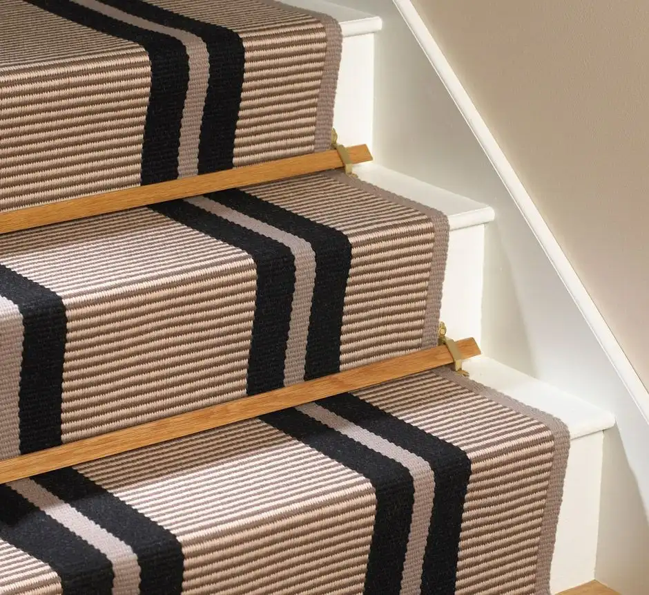 Beige and black striped flatweave stair carpet runner fitted with wooden stair rods for Flatweave Stair Runners Dubai.
