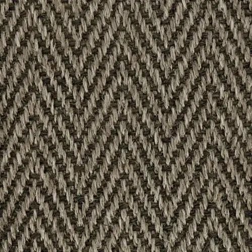Chevron patterned natural sisal carpet texture swatch featuring a durable herringbone weave in earthy tones for Sisal Stair Runners Dubai.