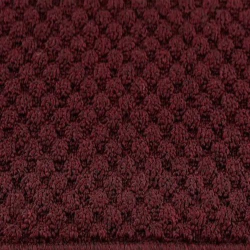 Dark red textured loop pile wool carpet texture swatch showcasing a rich, dense woven pattern for Wool Stair Runners Dubai.