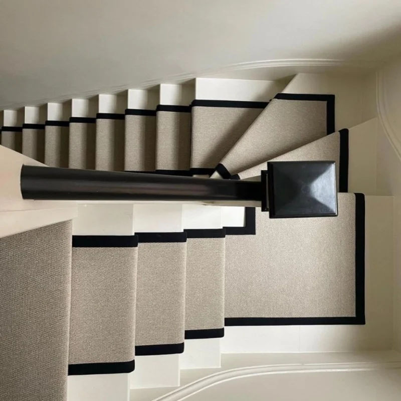 Modern Two-Tone Stair Carpet runner in beige with a black border on white stairs