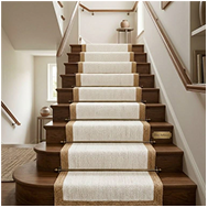 Natural jute stair runner with a textured finish for eco-friendly staircase decor.