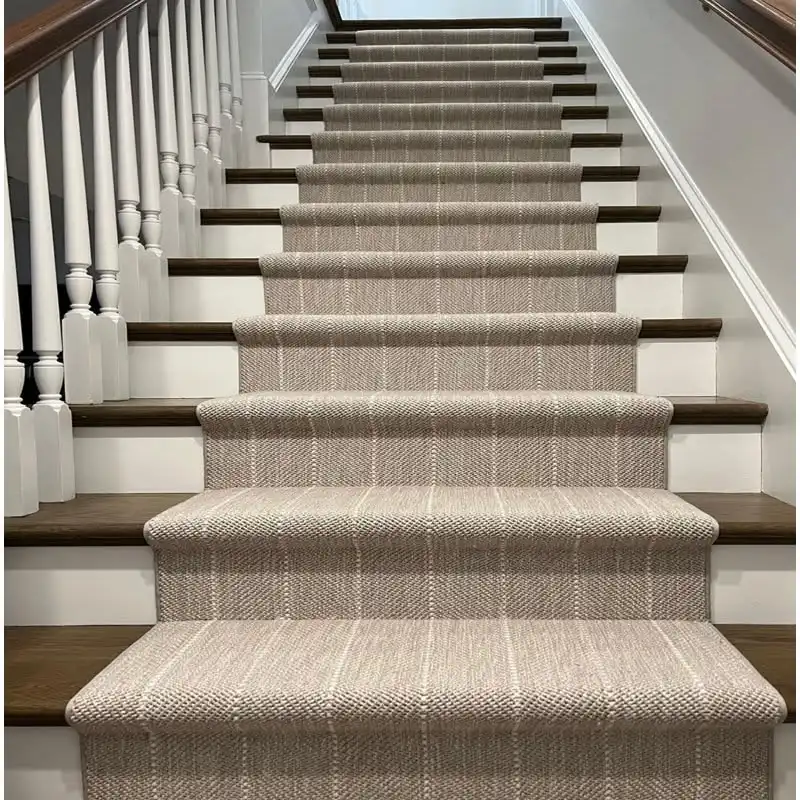 Premium wool striped carpet runner fitted on dark hardwood stairs for Wool Stair Runners Dubai.